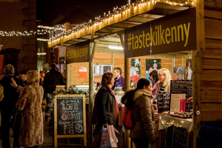 People at stalls at Yulefest Market Kilkenny