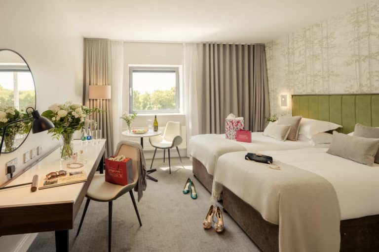 Deluxe Double Room with shopping bags at The Hoban Hotel
