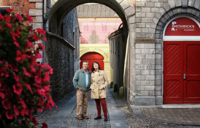 Couple standing outside Smithwicks Experience in Kilkenny
