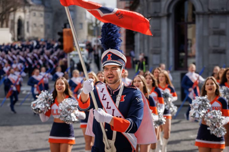 Man Waving Flag in St. Patrick's Day Parade in Kilkenny